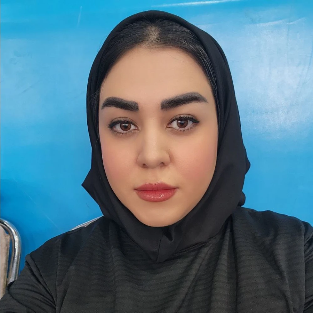 مریم مهاجر مربی و داور رسمی کیک‌بوکسینگ و موی‌تای در مشهد